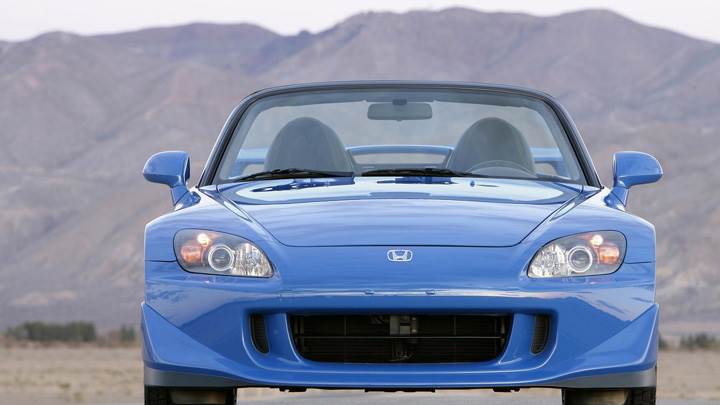 Front Pose Of 2009 Honda S2000 CR In Blue Near Mountains